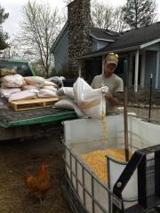 Picture of Nate mixing poultry feed