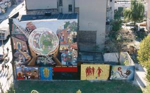 Collective mural and individual murals from La Lucha Continua The Struggle Continues, 1985, La Plaza Cultural, Loisaida. Photo: Camille Perrottet
