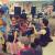 children gather around performer at National Night Out in Garfield